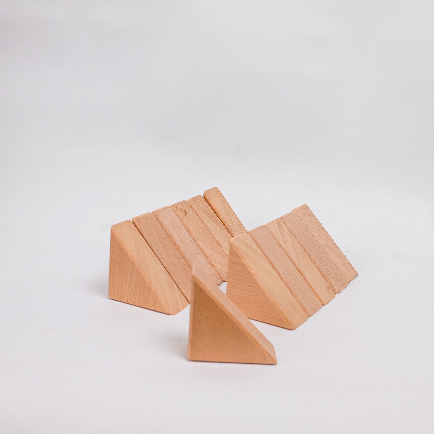 Set of 12 Small Isosceles Triangles - Natural Unit Blocks